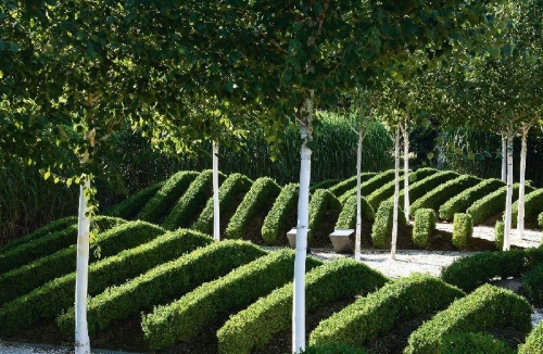 Buchcover und Innenansicht für das Buch: Exklusives Gartendesign - Spektakuläre Privatgärten