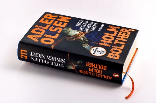 Buchcover und Innenansicht für das Buch: Døde sjæle synger ikke
