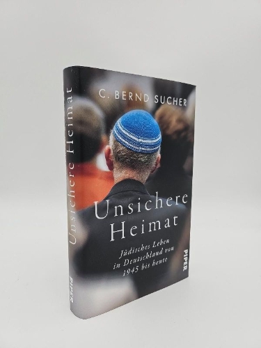 Buchcover und Innenansicht für das Buch: Unsichere Heimat