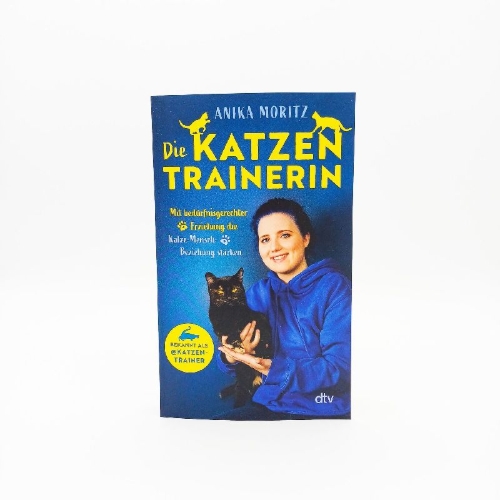 Buchcover und Innenansicht für das Buch: Die Katzentrainerin