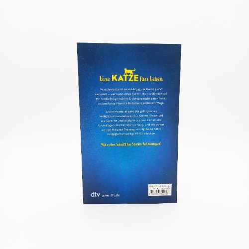 Buchcover und Innenansicht für das Buch: Die Katzentrainerin