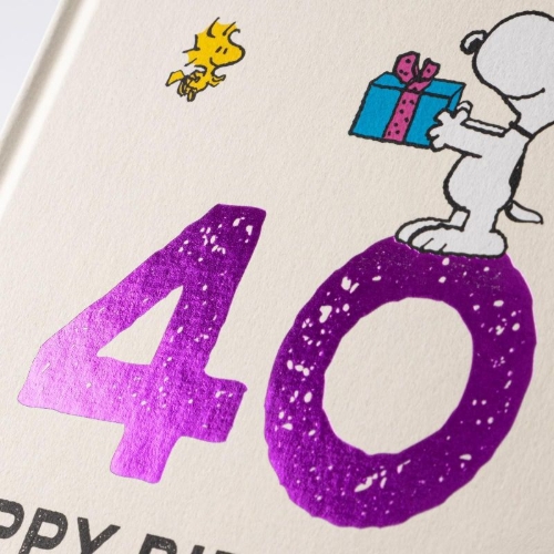 Buchcover und Innenansicht für das Buch: Peanuts Geschenkbuch: Happy Birthday zum 40. Geburtstag