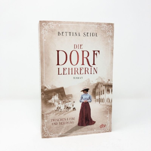 Buchcover und Innenansicht für das Buch: Die Dorflehrerin