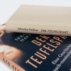 Buchcover und Innenansicht für das Buch: Der Teufelspakt