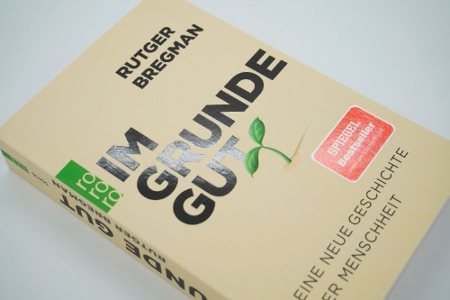 Buchcover und Innenansicht für das Buch: De Meeste Mensen Deugen/Humankind