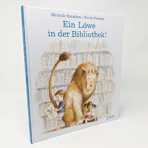 Buchcover und Innenansicht für das Buch: Library Lion