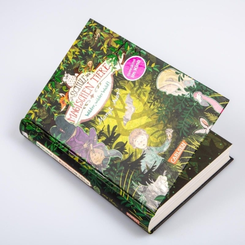 Buchcover und Innenansicht für das Buch: Die Schule der magischen Tiere 11: Wilder, wilder Wald!