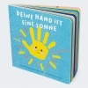 Buchcover und Innenansicht für das Buch: Ta petite main comme un soleil