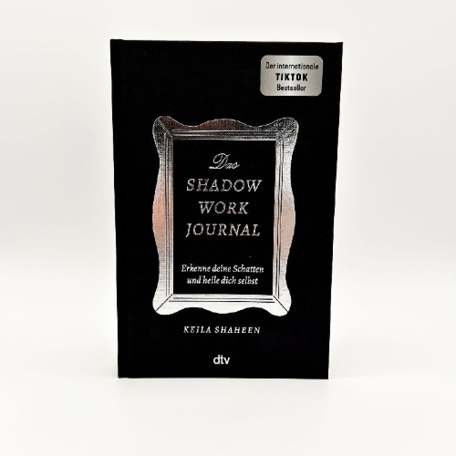 Buchcover und Innenansicht für das Buch: Das Shadow Work Journal