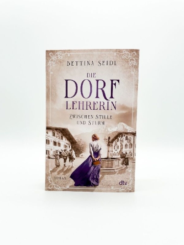Buchcover und Innenansicht für das Buch: Die Dorflehrerin