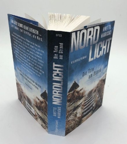 Buchcover und Innenansicht für das Buch: Nordlicht - Die Tote am Strand