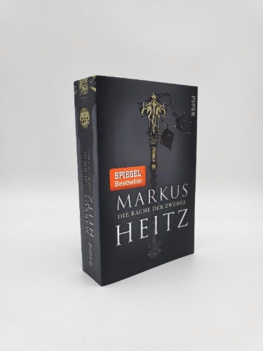 Buchcover und Innenansicht für das Buch: Die Rache der Zwerge
