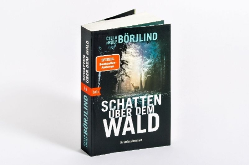 Buchcover und Innenansicht für das Buch: Skugga över Slagtjärn