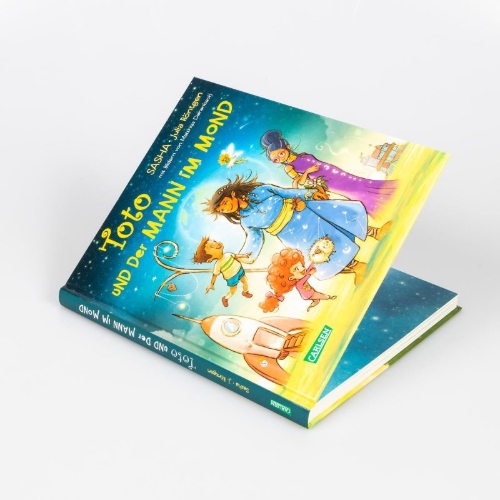 Buchcover und Innenansicht für das Buch: Toto und der Mann im Mond