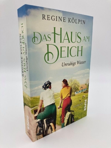 Buchcover und Innenansicht für das Buch: Das Haus am Deich - Unruhige Wasser